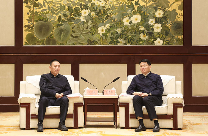 姜冬冬会见新疆商贸物流集团党委书记、董事长沈金生一行